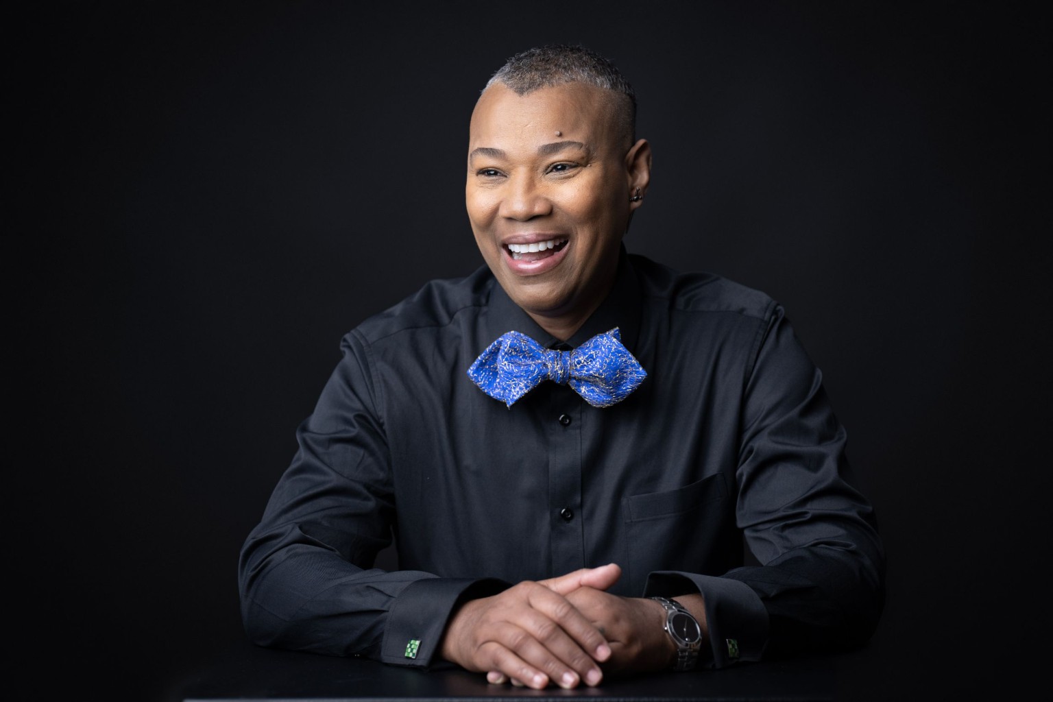 Karen Anastasia Prescod wearing a blue bow tie